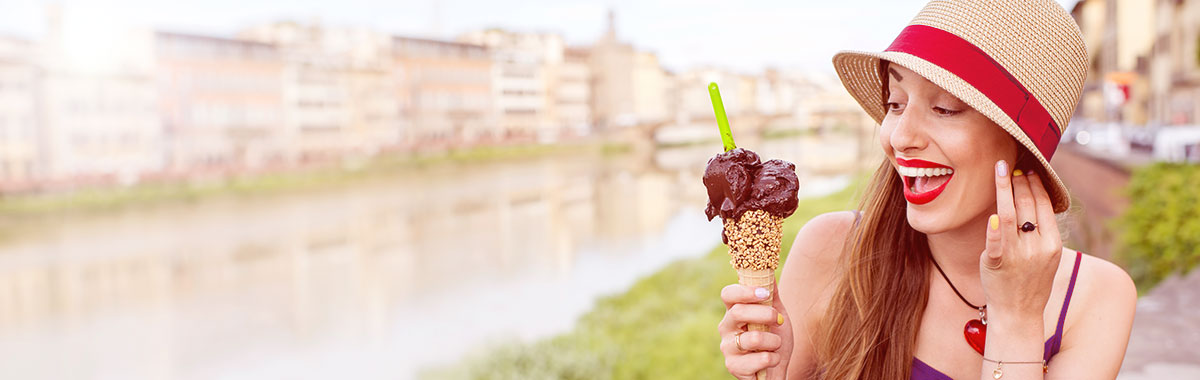 woman eating gelato in Italy