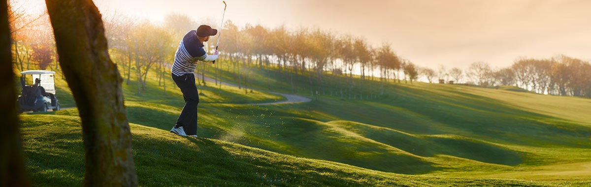 golfer swinging a club