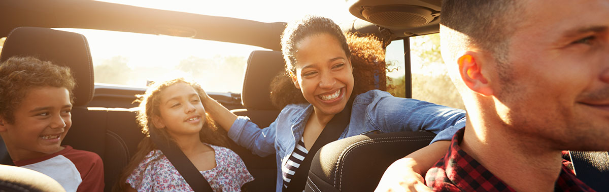 family on a trip in a car